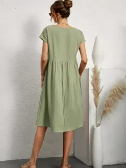 Short Sleeves Midi Shift Dress for Women - Minimalist Solid Color Loose T-shirt Dress with Pockets - Summer Daily Casual 2026